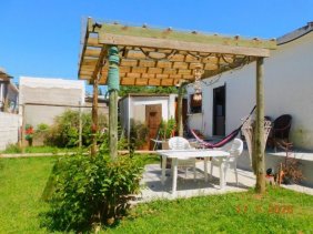 VENDO HERMOSA CASA DE 2 DORM. CON TERRENO.TODA DE PLANCHA.